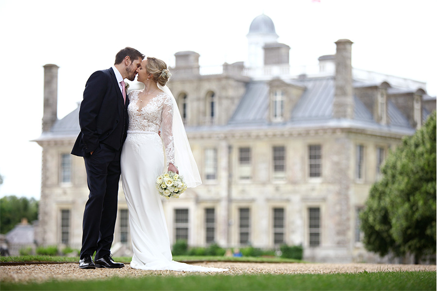 Bride and groom at Kingston Lacy in Dorset, a luxury UK wedding venue