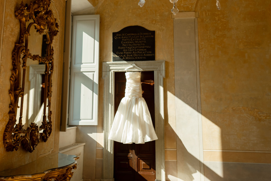Wedding-dress-photo hanging on door