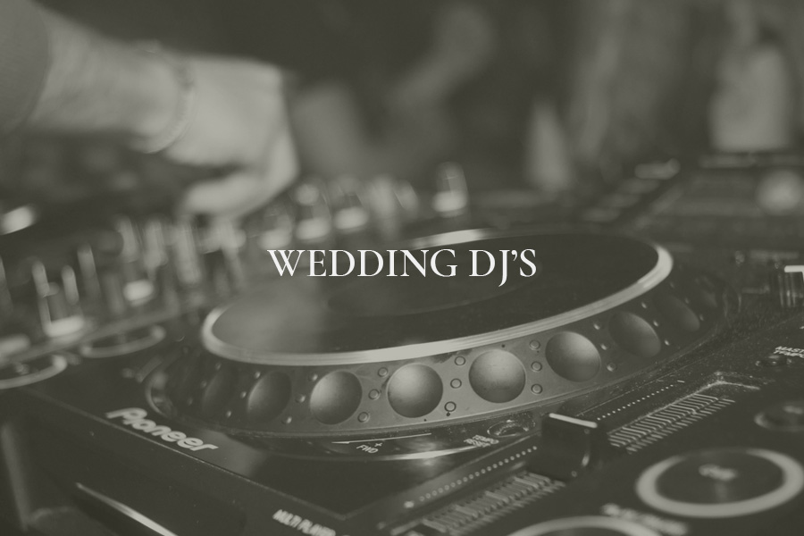 dorset-wedding-dj-deck-live-performance Wedding DJ setup with professional decks performing at a Dorset wedding reception