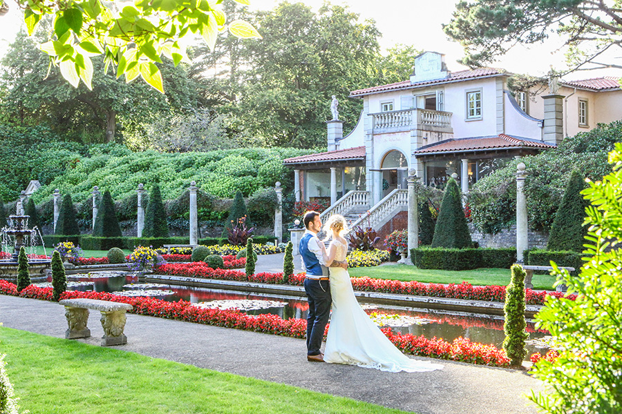 Bride and groom at Dorset wedding venue The Italian Villa in Poole with formal gardens