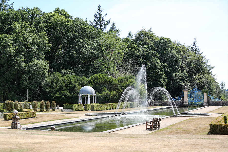 Outdoor wedding venue in Hampshire with formal gardens and fountain water feature