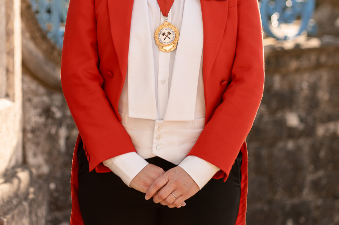 Wedding toastmaster using ceremonial hammer during a Hampshire wedding reception