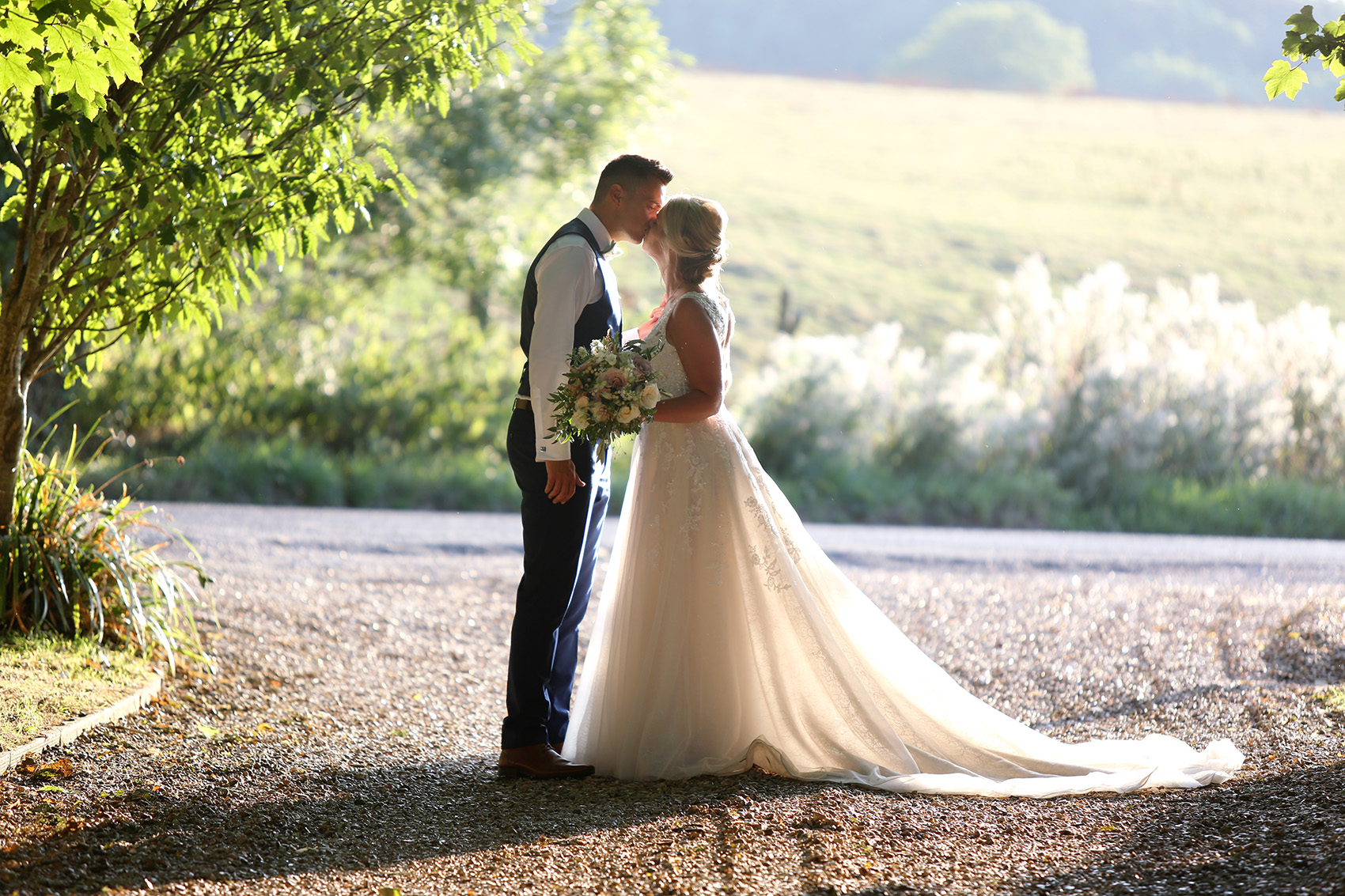 kingston-country-courtyard-wedding-venue-dorset-countryside-couple Bride and groom at Kingston Country Courtyard wedding venue in Dorset countryside