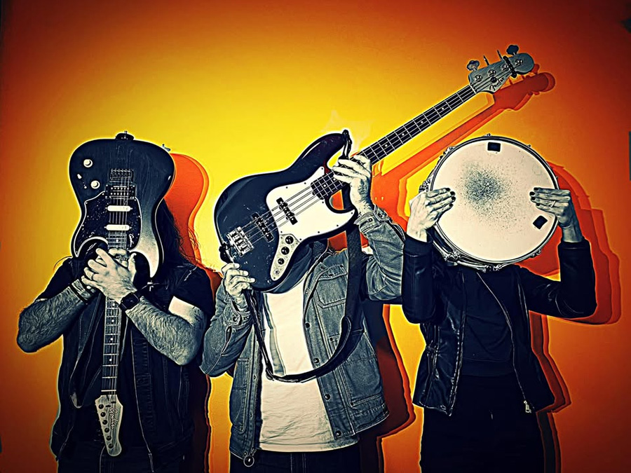 The Moonrunners wedding band promotional image with instruments and bold graphic background