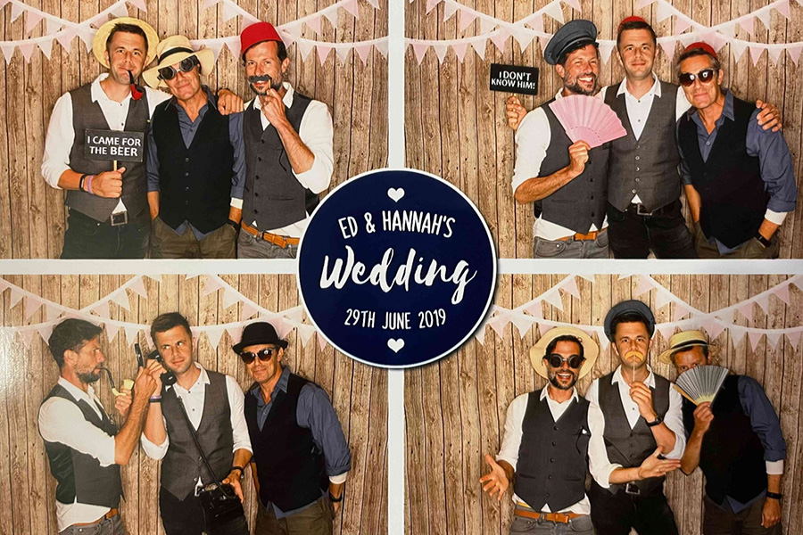 The Royal T’s wedding band posing in photo booth during wedding celebration