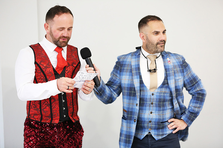 Bournemouth wedding magician Magic by Alfie performing table magic and interacting with guests using microphone