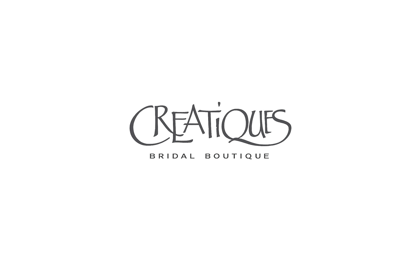 Creatiques Bridal Boutique logo in soft grey with elegant script lettering and minimal serif subtext