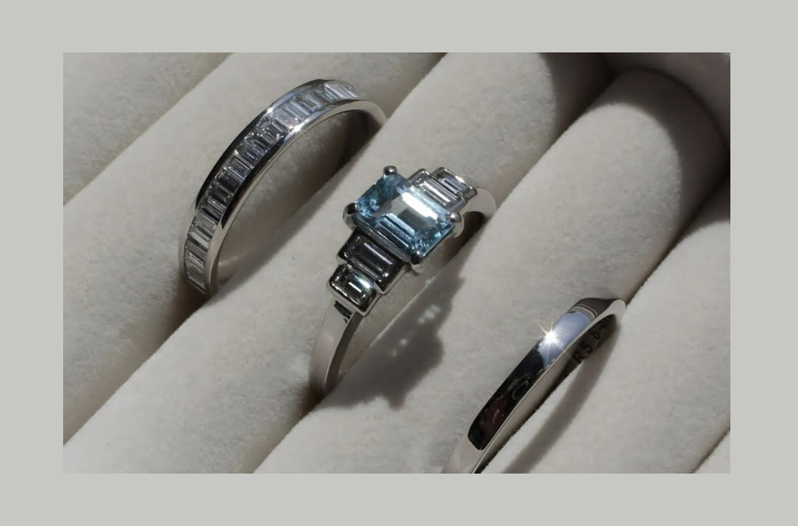 Bespoke wedding rings with aquamarine and diamond design by FANCI Jewellery Southampton Hampshire