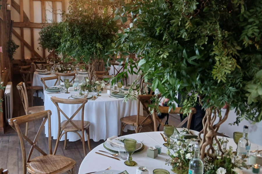Wedding table styling with greenery and natural floral design by Ivy and Wild, Wiltshire wedding florist