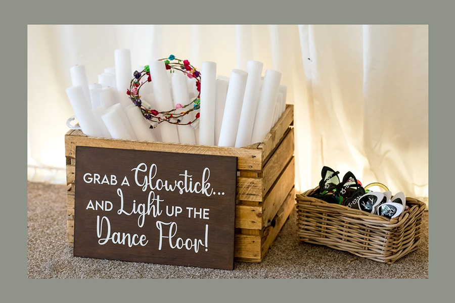 Mae and Maple glowstick wedding prop display with sign and crates for dance floor fun Hampshire