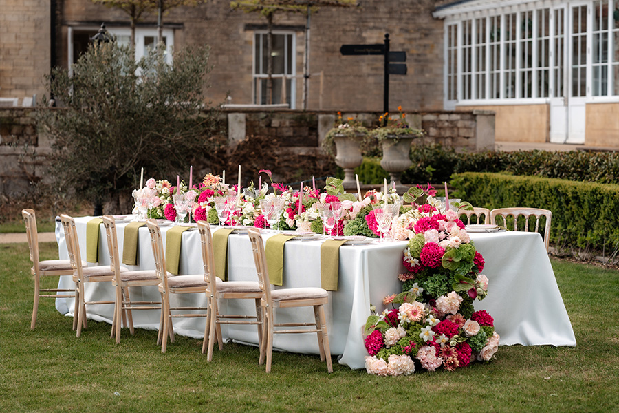 Monets Floris wedding flowers styling long table floral arrangements outdoor Dorset wedding