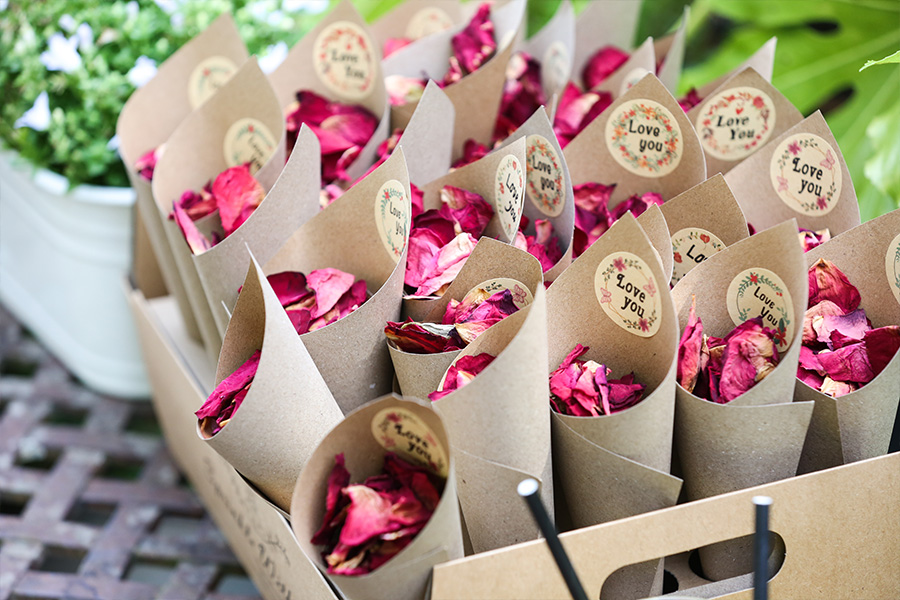 Confetti cones with rose petals at The Old Vicarage wedding venue Dorset ready for guests