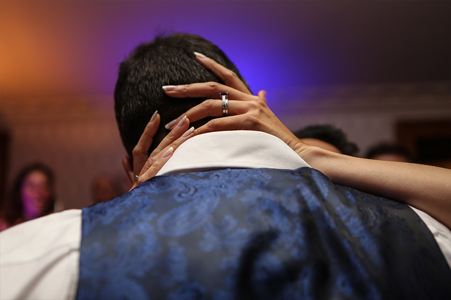 Close up of bride and groom during first dance showing emotional connection