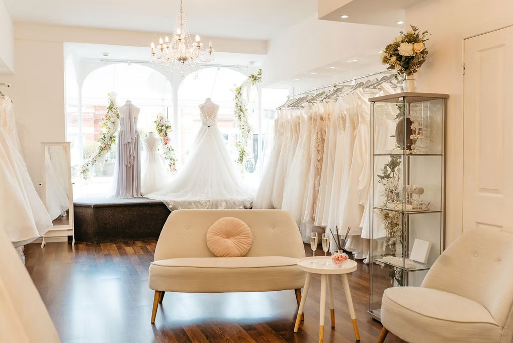 Sarah Jane Bridal boutique interior in Poole Dorset with wedding dresses displayed in a bright luxury bridal shop setting 